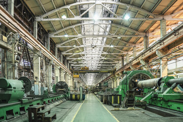 Wall Mural - Metalwork factory with machines and lathes for processing metal production, industrial interior.