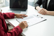 © Orathai - Business people hold a resume and talk to work applicants for work interviews about careers and Their personal history in the company. Recruitment concepts