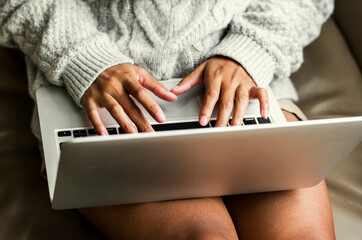 Wall Mural - woman working on a laptop