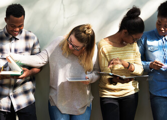 Wall Mural - Group of college students studying for examination