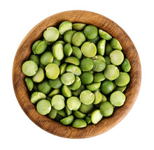Dried Green Peas In A Wooden Bowl Isolated On White Background. With Clipping Path.