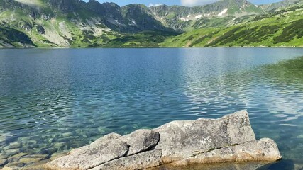 Wall Mural - The Great Polish Pond. The Valley of the Five Polish Ponds. Polish Tatra Mountains