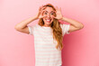 © Asier - Caucasian blonde woman isolated on pink background keeping eyes opened to find a success opportunity.
