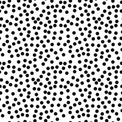 Poster - Seamless black dots on white background. Vector black flakes.