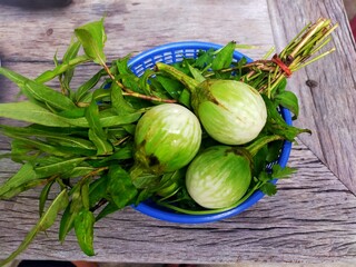 Wall Mural - vegetable basket on wooden table