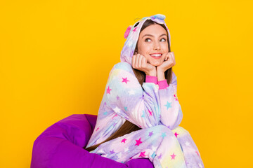 Sticker - Portrait of attractive cheery dreamy girl wearing animal clothes thinking fantasizing isolated over bright yellow color background