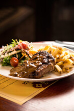 Steak And Chips Meal At Pub