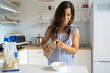 © Jake Jakab - portrait of happy woman preparing healthy breakfast