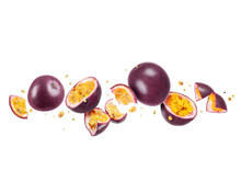 Whole And Sliced Passion Fruit (passiflora) In The Air On A White Background