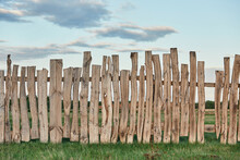 Old Wooden Plank Fence Of Vertical Flat Boards