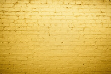 Close Up Of A Yellow Brick Wall Background