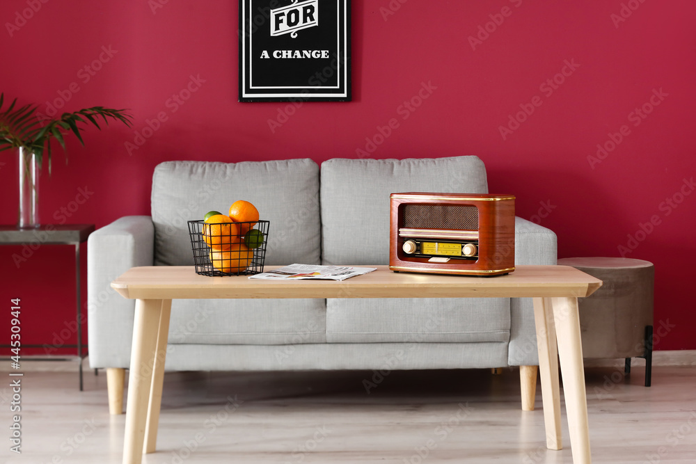 Interior of stylish living room with retro radio receiver - obrazy, fototapety, plakaty 