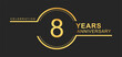 8th years anniversary golden and silver color with circle ring isolated on black background for anniversary celebration event