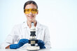 © SHOTPRIME STUDIO - Woman in white coat laboratory microscope research biotechnology