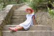 Teen Girl 9 years Laying On The Stone Stairs