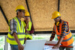 © visoot - Engineer meeting with architect working and drawings inspection in workplace at construction site,Engineering tools and construction concept.