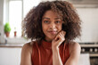 © ReeldealHD images - Portrait of happy African American female at home in kitchen