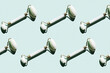 © Gemma Ferrando/Westend61 - Pattern of marble jade rollers flat laid against mint green background