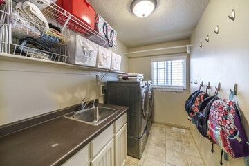 Sticker - Interior of a laundry room in an apartment