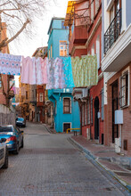 Turkey, Istanbul, Laundry Drying Over Alley In Balat Neighborhood