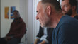 © Framestock - Senior man sharing feelings with group