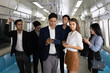 © offsuperphoto - portrait group of business people in subway train