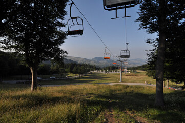 Wall Mural - Closeup shot of cable cars in Monte Carpegna mountain in Italy