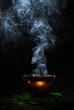 The witch's smoking cauldron on dark background.