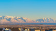Pano A panoramic view of the mountains with the clear blue sky in the background