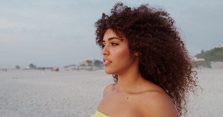 Wall Mural - Black beautiful attractive afro young cute girl, curly hair, bikini, famous beach Rio de Janeiro, Brazil. Latin summer vacation holiday