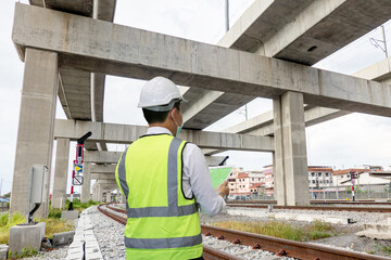 engineer is checking on infrastructure and construction site.