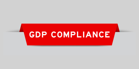 Sticker - Red color inserted label with word GDP (Abbreviation good distribution practice) compliance on gray background