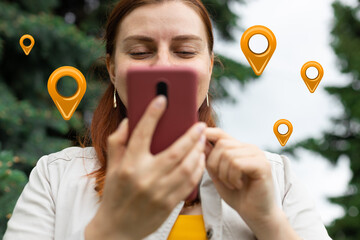 Traveler woman hands use map on mobile phone app to search for route location of place with gps on street when travel in city