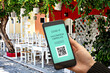 vaccination qr code,vaccine certificate and digital passport of covid-19, , hand with mobile phone in restaurant