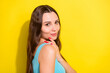 © deagreez - Photo portrait girl with long hair wearing casual singlet touching shoulder tender isolated vibrant yellow color background