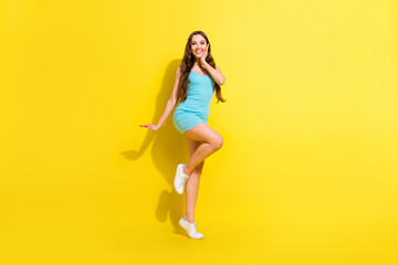 Poster - Full length body size view of attractive amazed cheerful girl dancing having fun posing isolated over bright yellow color background