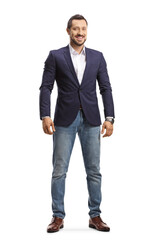 Poster - Full length portrait of a man in jeans and suit standing and smiling