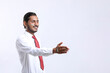 © Niks Ads - Young Indian man handshaking after good deal.