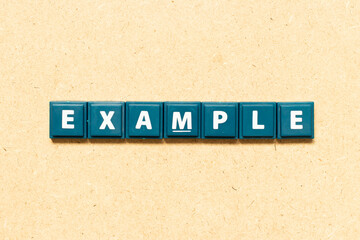 Wall Mural - tile alphabet letter in word example on wood background