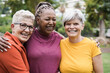 © DisobeyArt - Multiracial senior women having fun together after sport workout outdoor - Focus on left female face