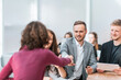 © yurolaitsalbert - close up. young people shaking hands at an office meeting