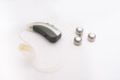 Hearing aid with batteries in white background