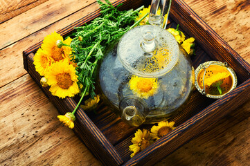 Wall Mural - Teapot with fresh flower tea,brewing tea