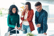 © nenetus - Confident business team talking with colleagues in the meeting on coworking space.