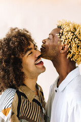 Wall Mural - Romantic gay couple posing in a studio