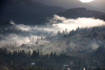 Wall Mural - Magic dawn in the misty mountains