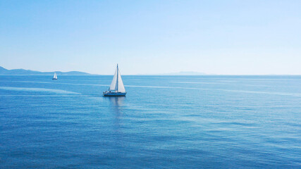 Wall Mural - Aerial view of sailing luxury yacht at opened sea at sunny day in Croatia