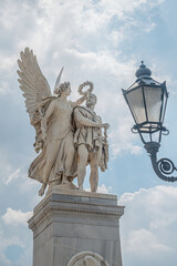 Wall Mural - Closeup view at Roman statues in Schloss Bridge near Berlin Cathedral and Unter den Linden street in historical and museum downtown of Berlin, Germany.