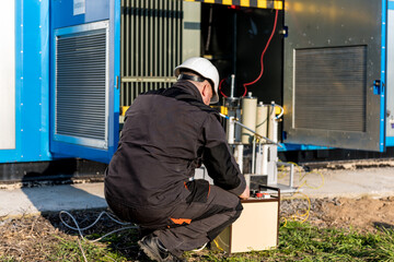 Wall Mural - execution of electrical measuring works on the power transformer