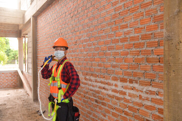 Wall Mural - Roofer Construction worker install new roof,Roofing tools